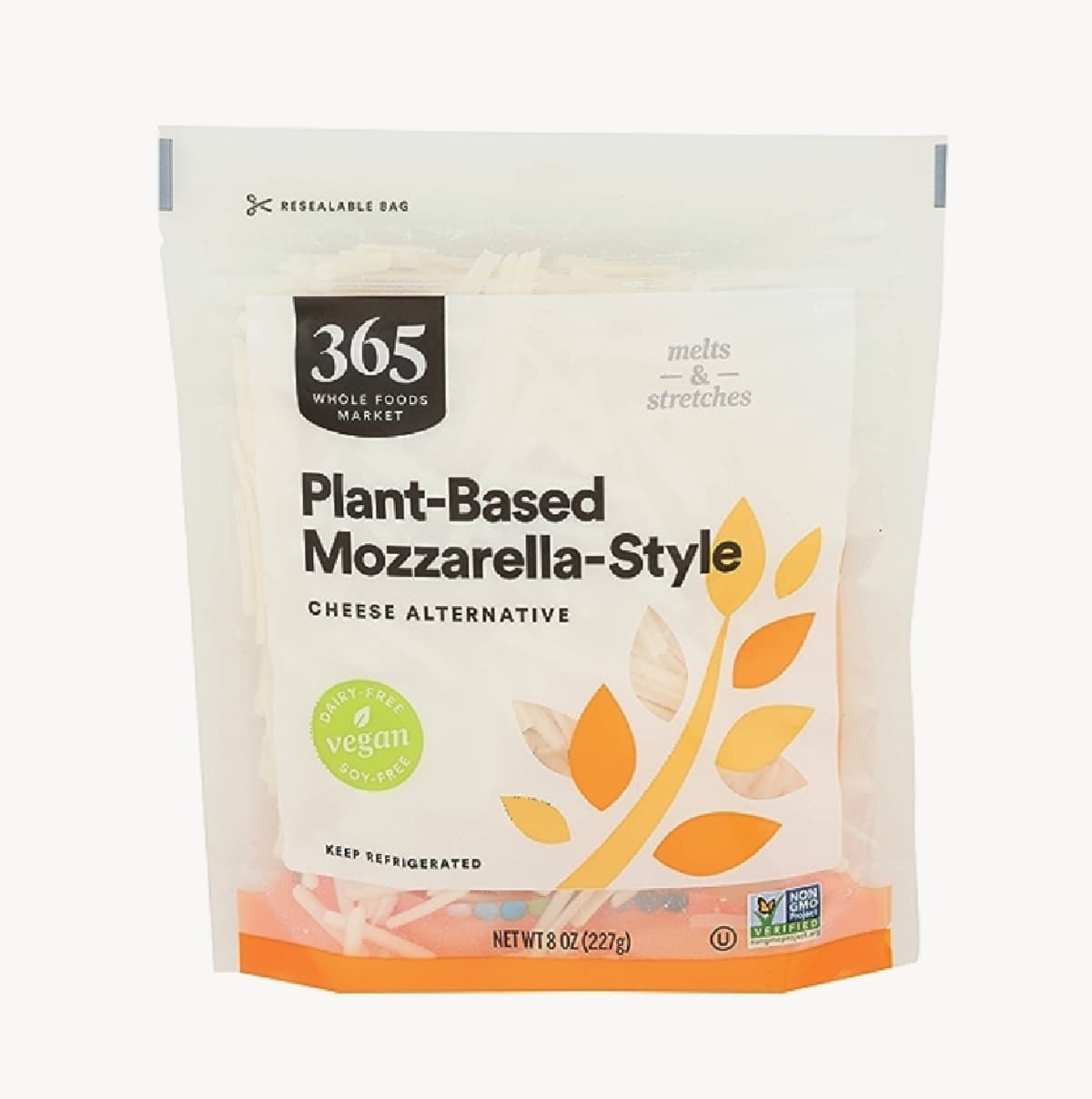 A white pouch of Whole Foods Market 365 Plant-Based Mozzarella Style vegan cheese against a white background. 