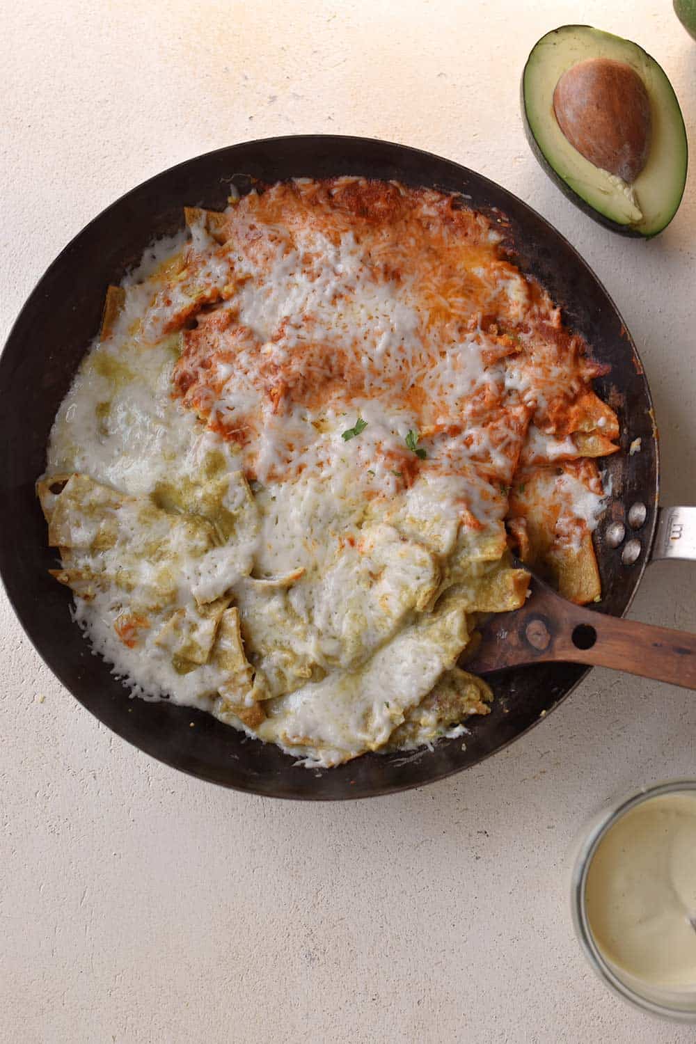 red and green vegan chilaquiles in a pan