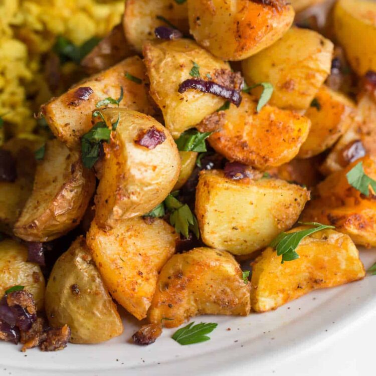 Air fryer home fries on a plate.