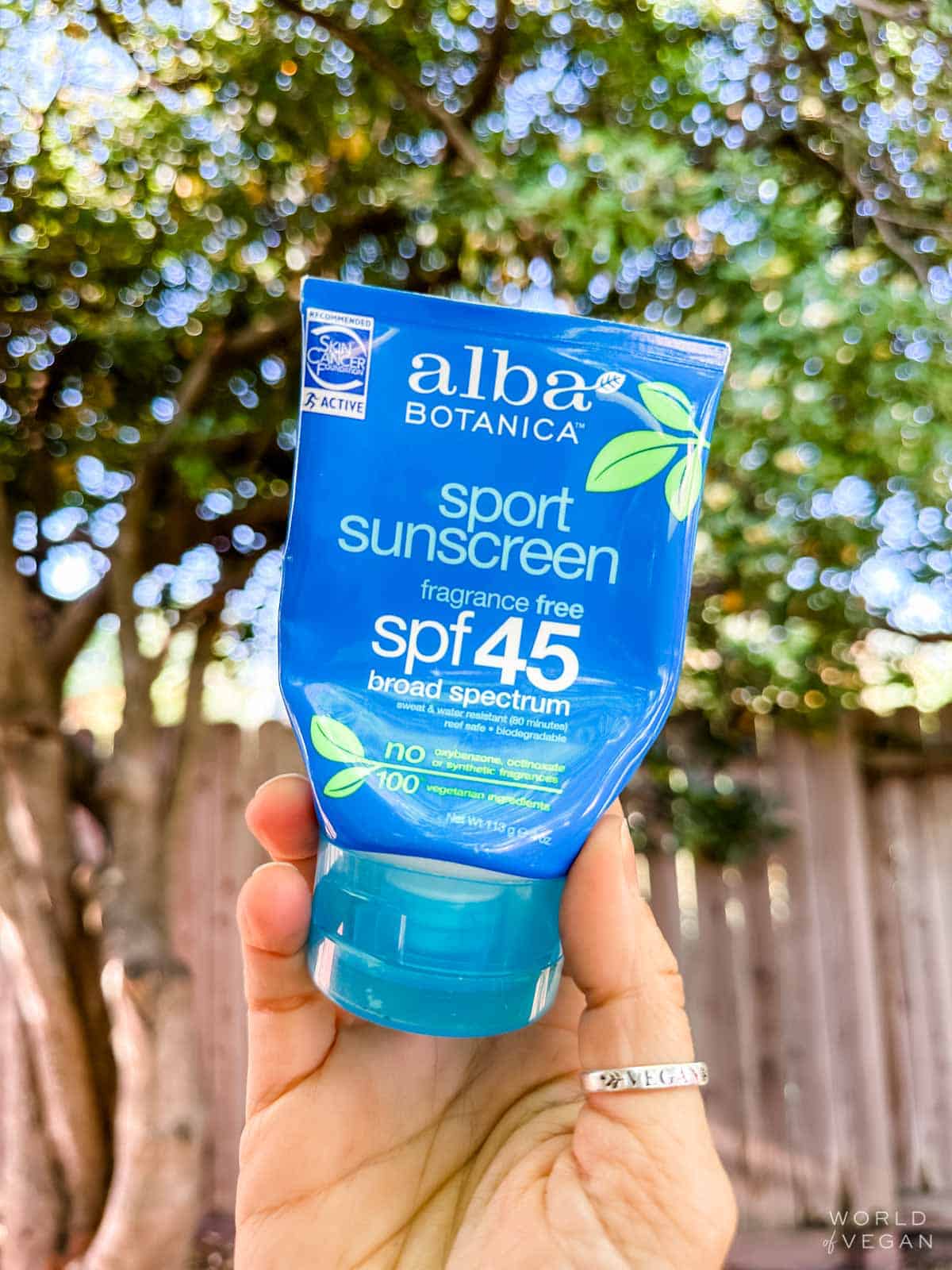 Blue container of Alba Botanica's spf 45 vegan sunscreen. 