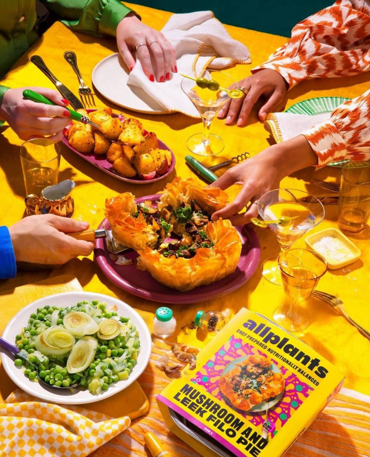 A table filled with items from allplants vegan meal delivery service.