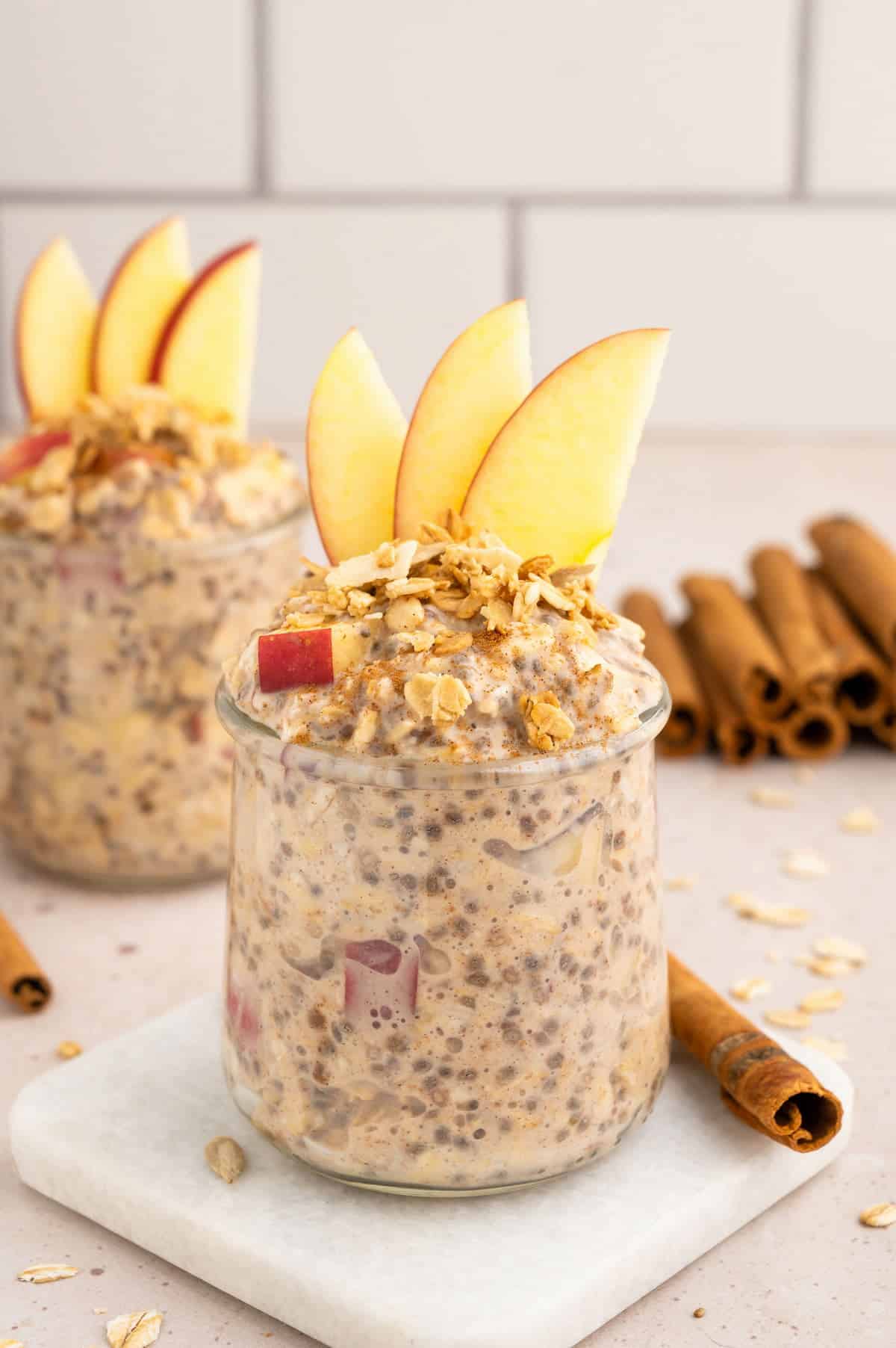 Two jars of apple pie overnight oats.