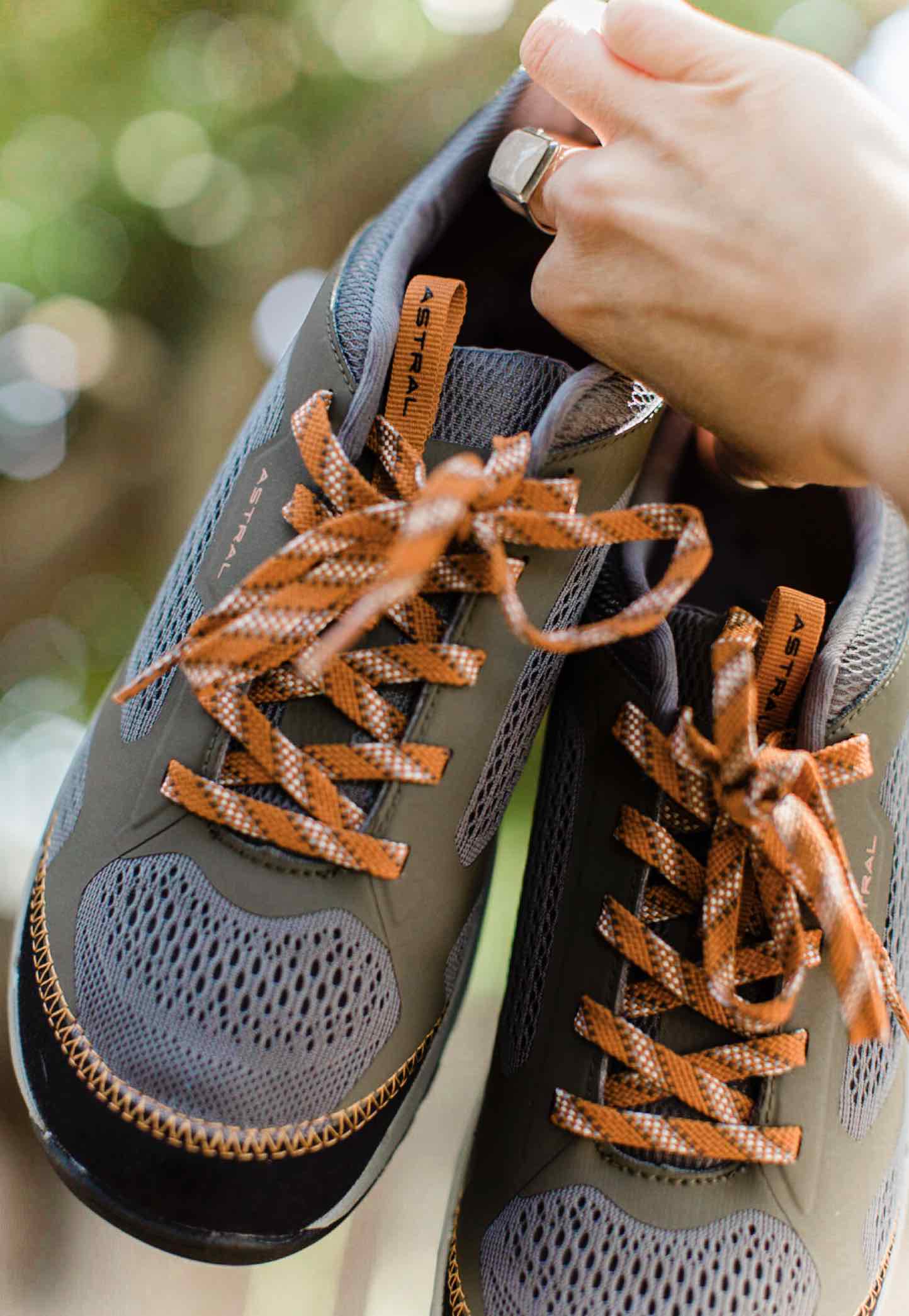 Astral Vegan Hiking Shoes with orange laces. 