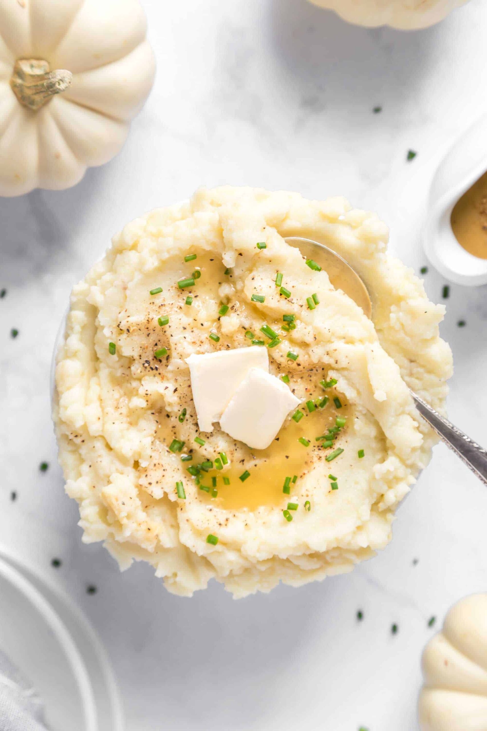 Vegan Mashed Potatoes topped with  butter.