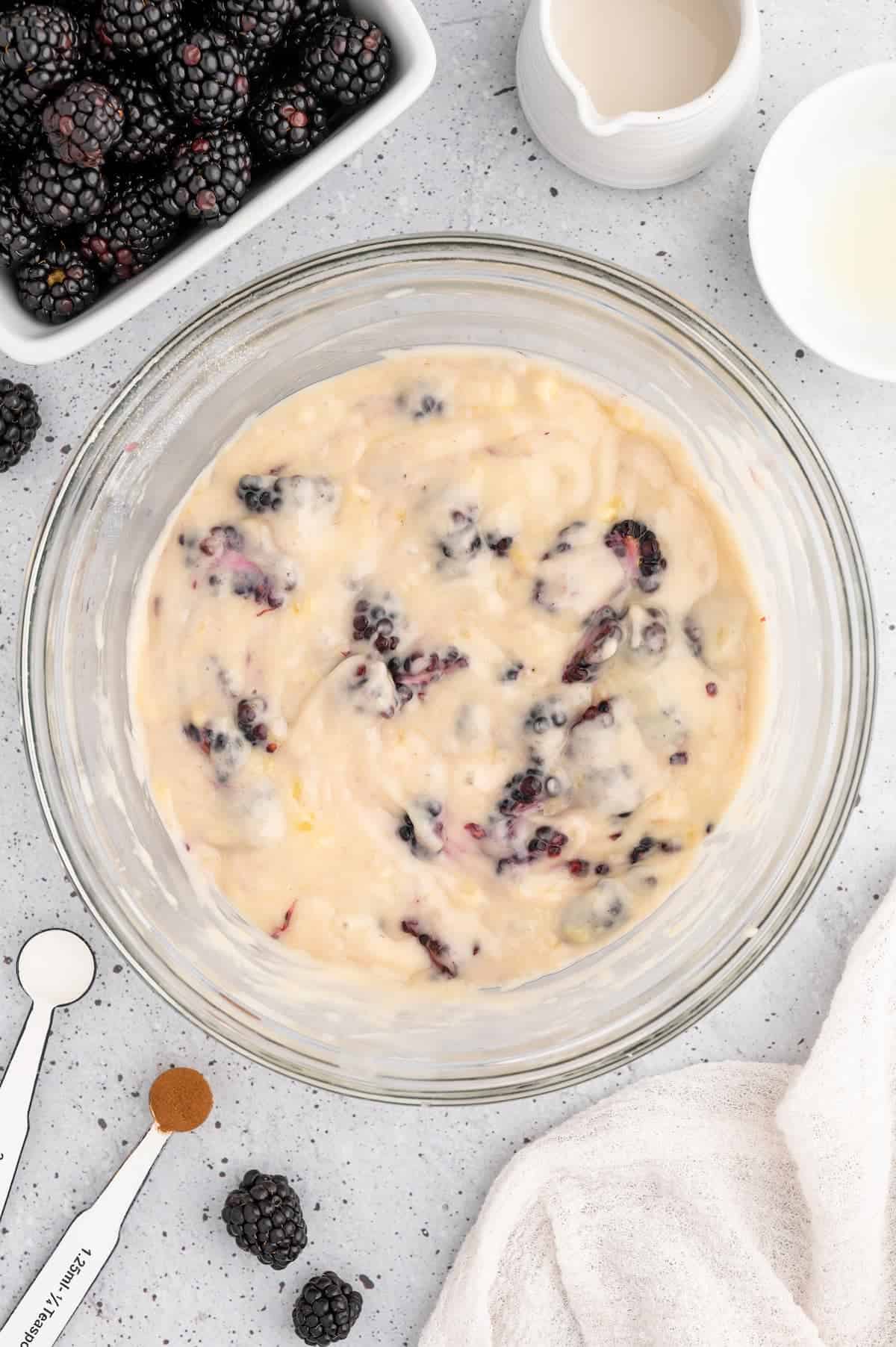 Vegan blackberry muffin batter in a bowl.