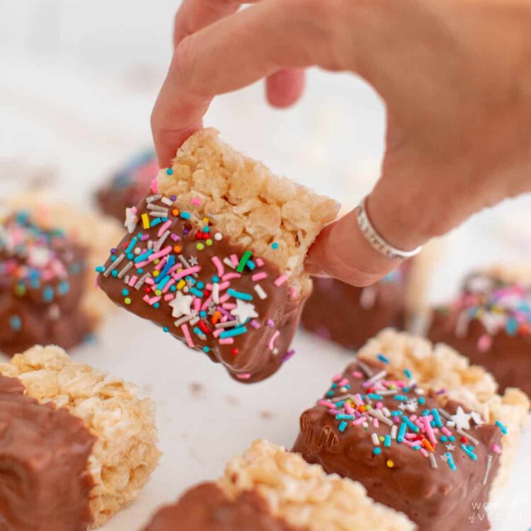 batch of chocolate covered rice krispies treats with sprinkles