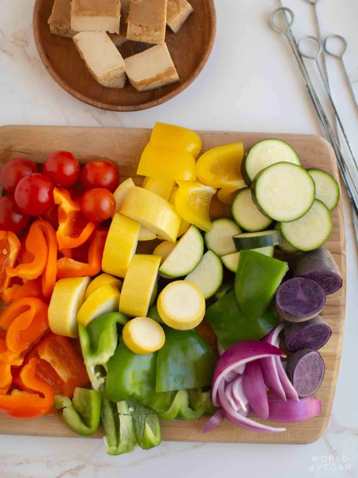 Chopped vegetables on a cutting board.