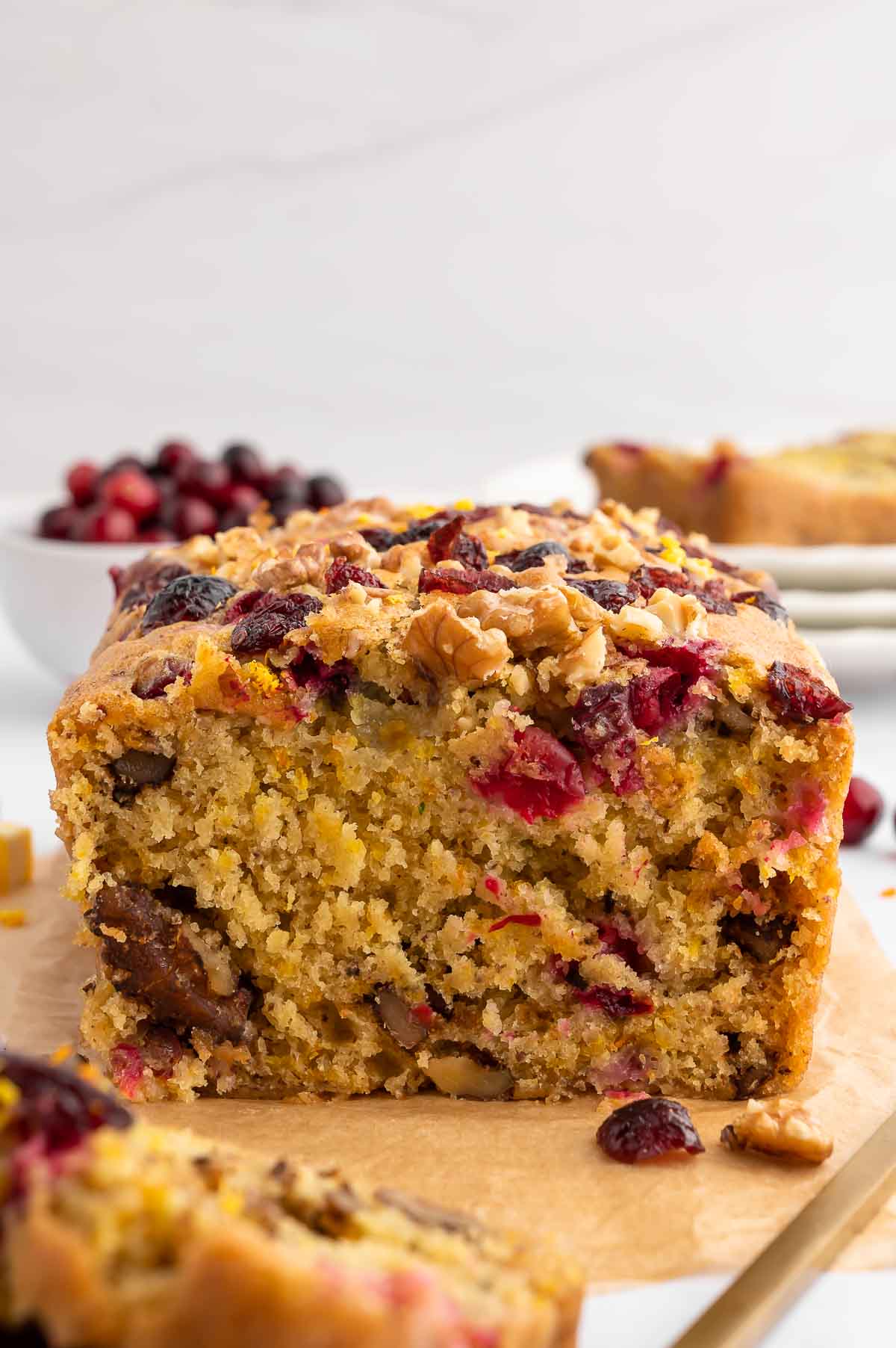 An interior shot of baked cranberry walnut bread.