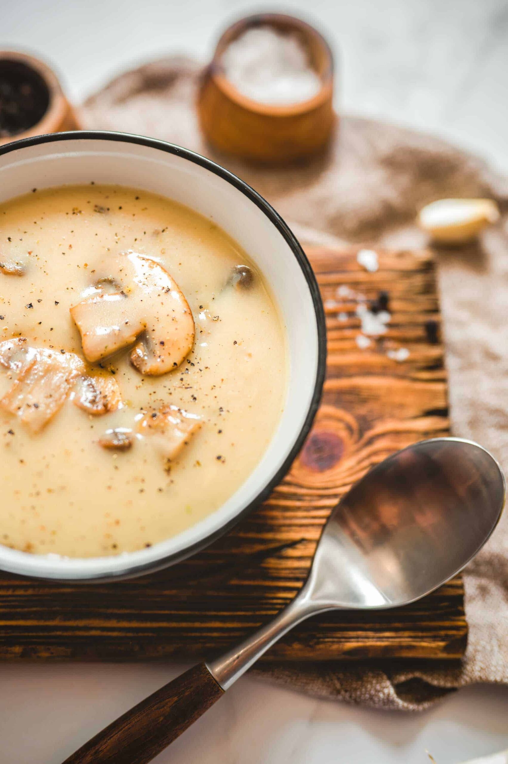 Easy Vegan Cashew Cream of Mushroom Soup in a Ceramic Bowl