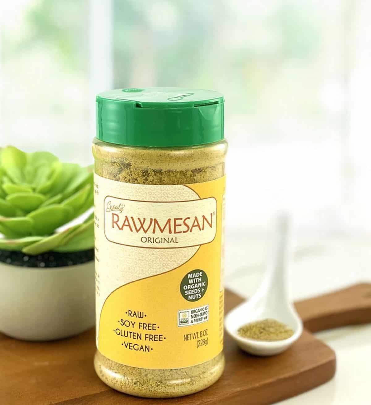 A container of Gopal's Rawmesan nut-based parmesan topping.