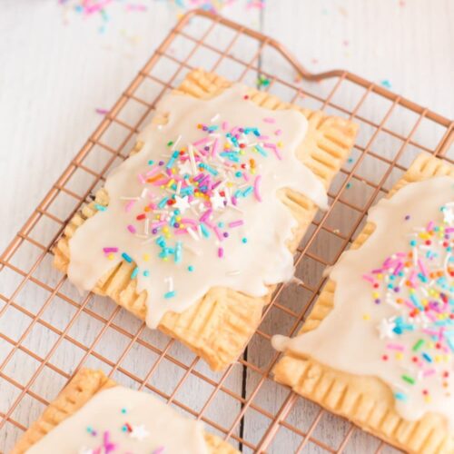homemade vegan strawberry frosted pop tarts with rainbow sprinkles