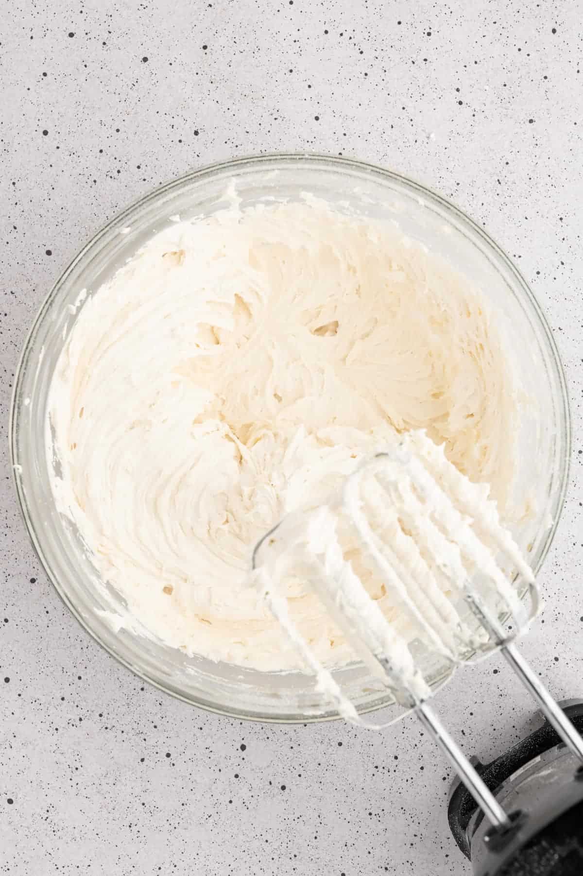 Vegan buttercream frosting in a mixing bowl.
