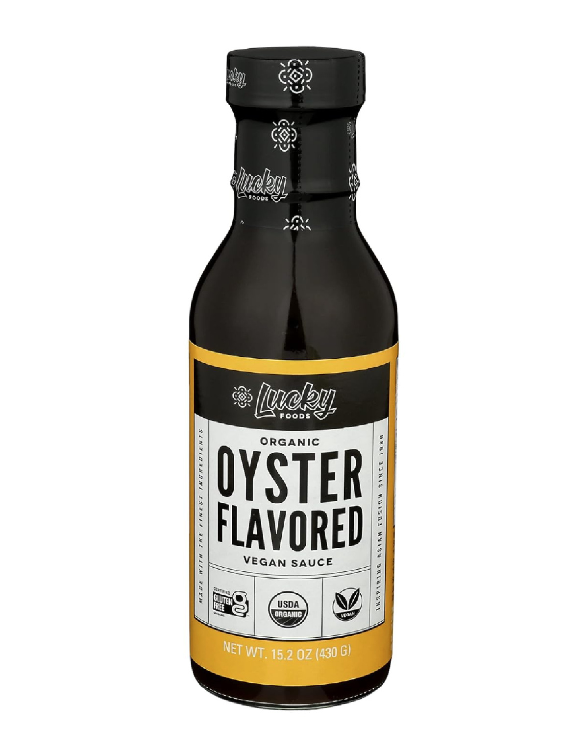 A tall dark bottle of Lucky Foods organic vegan oyster sauce with yellow and white label against a white background. 