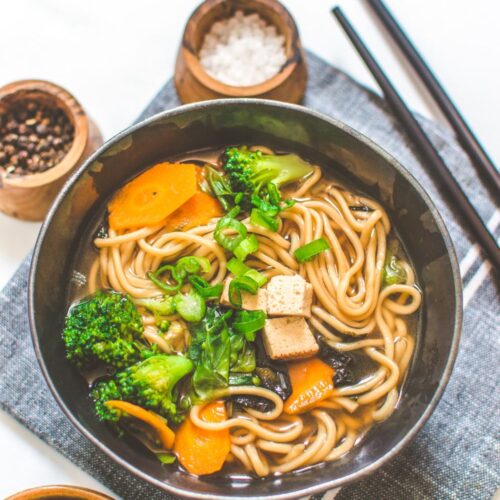 Miso Noodle Soup Bowl with Chop Sticks, Salt and Pepper on the Side