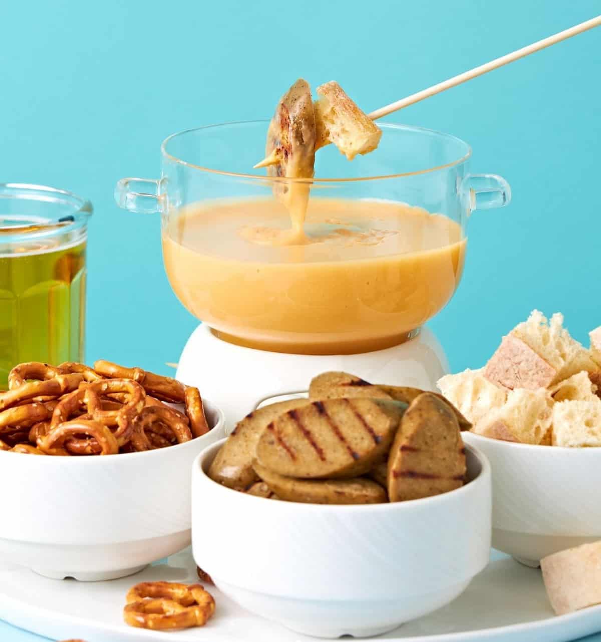 Vegan fondue made with Moocho Foods brand vegan cheddar.