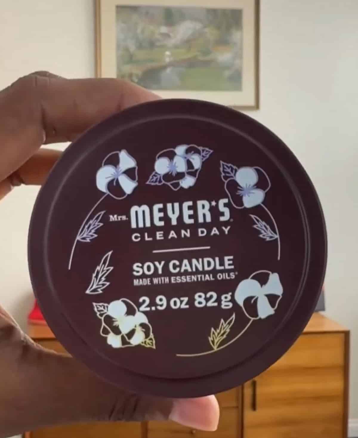 A lid from a Mrs. Meyer's  brand soy candle.