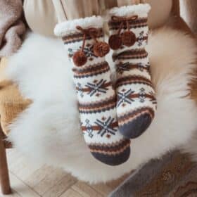 MukLuks vegan cozy faux fur knit cabin socks.