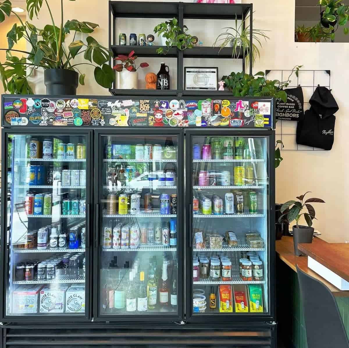 A beer fridge at Neighbors Taproom in Portland.