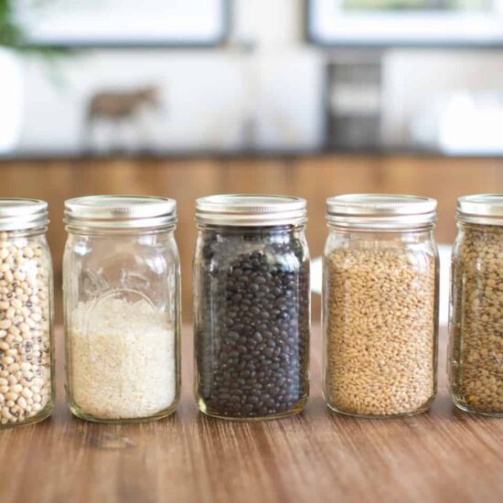 wide mouth mason jars filled with pantry staples