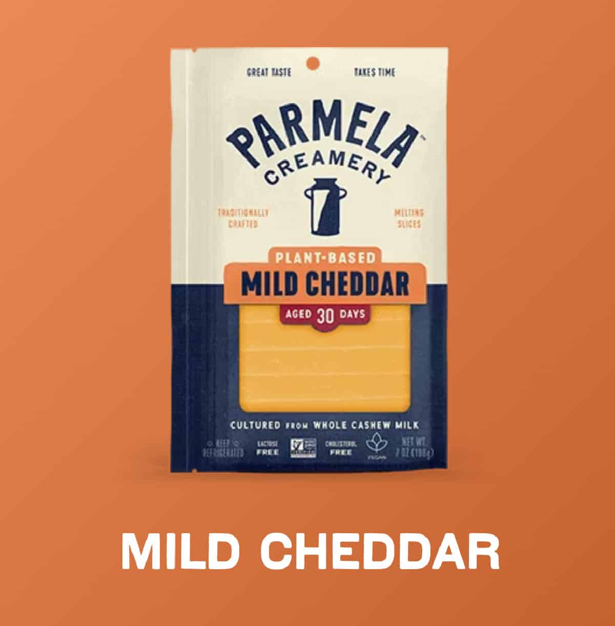A cream and navy blue package of Parmela Creamery Plant-Based Mild Cheddar Slices against a dark orange background. 