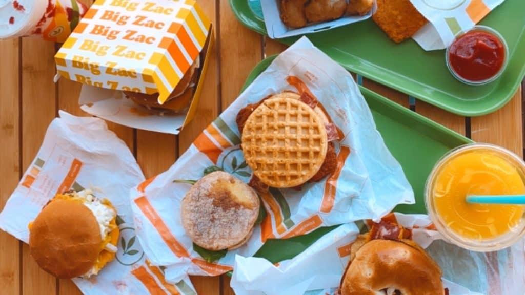 Spread of food on a table at Plant Power Fast Food in Sacramento