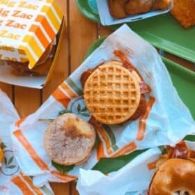 Spread of food on a table at Plant Power Fast Food in Sacramento