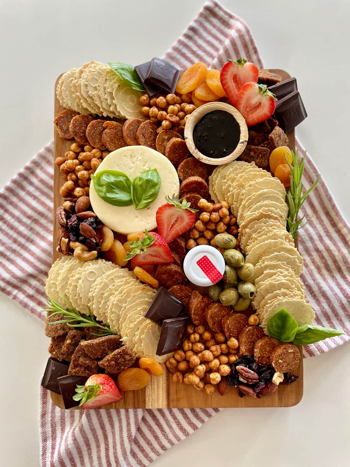 A display of vegan items included in Platterful's plant-based charcuterie kit.