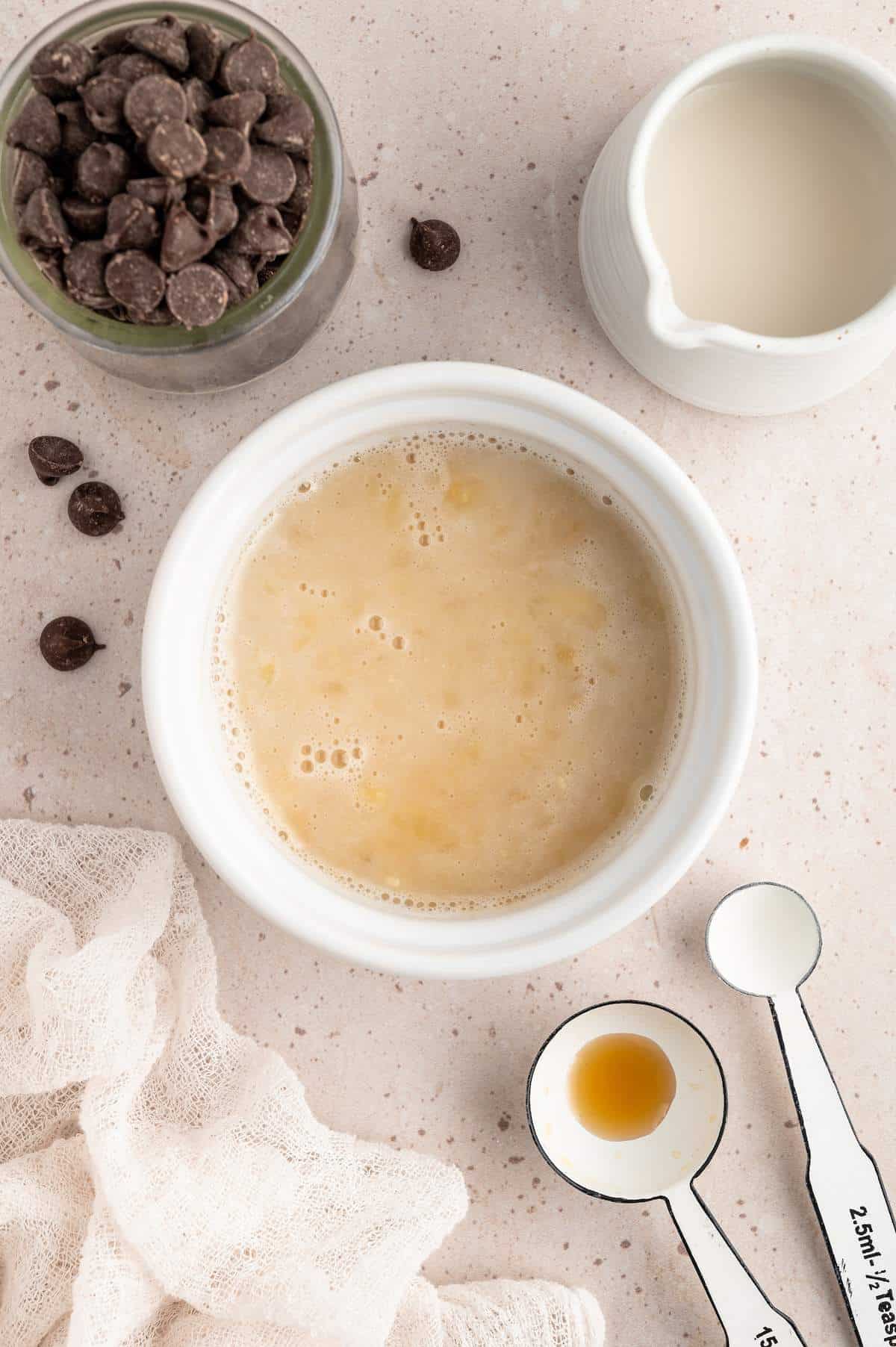 The ramekin after the rest of the liquid ingredients have been added and mixed.