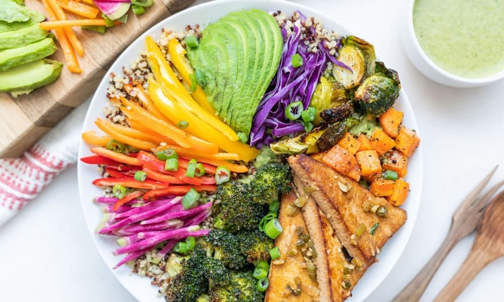 Gluten-Free Quinoa Veggie Buddha Bowl With Tahini Dressing Photo by Alfonso Revilla.