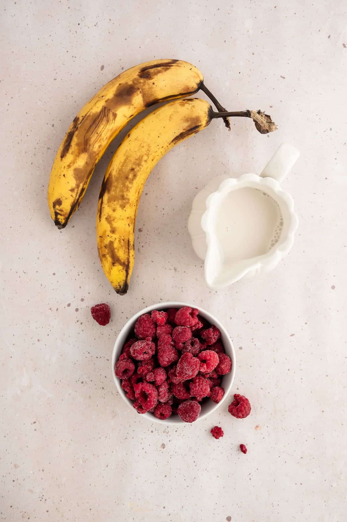 Ingredients for a raspberry smoothie.