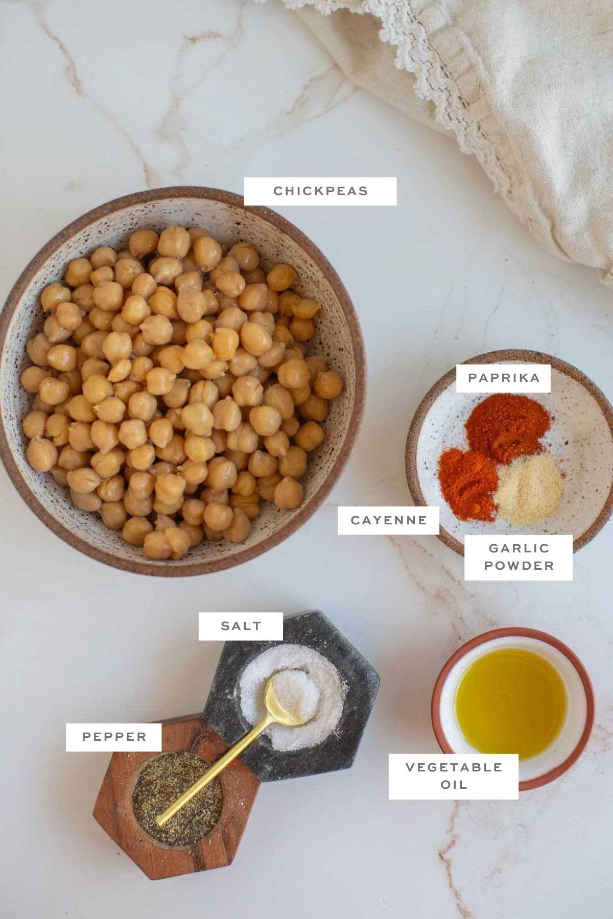Key ingredients for roasted chickpeas with labels.