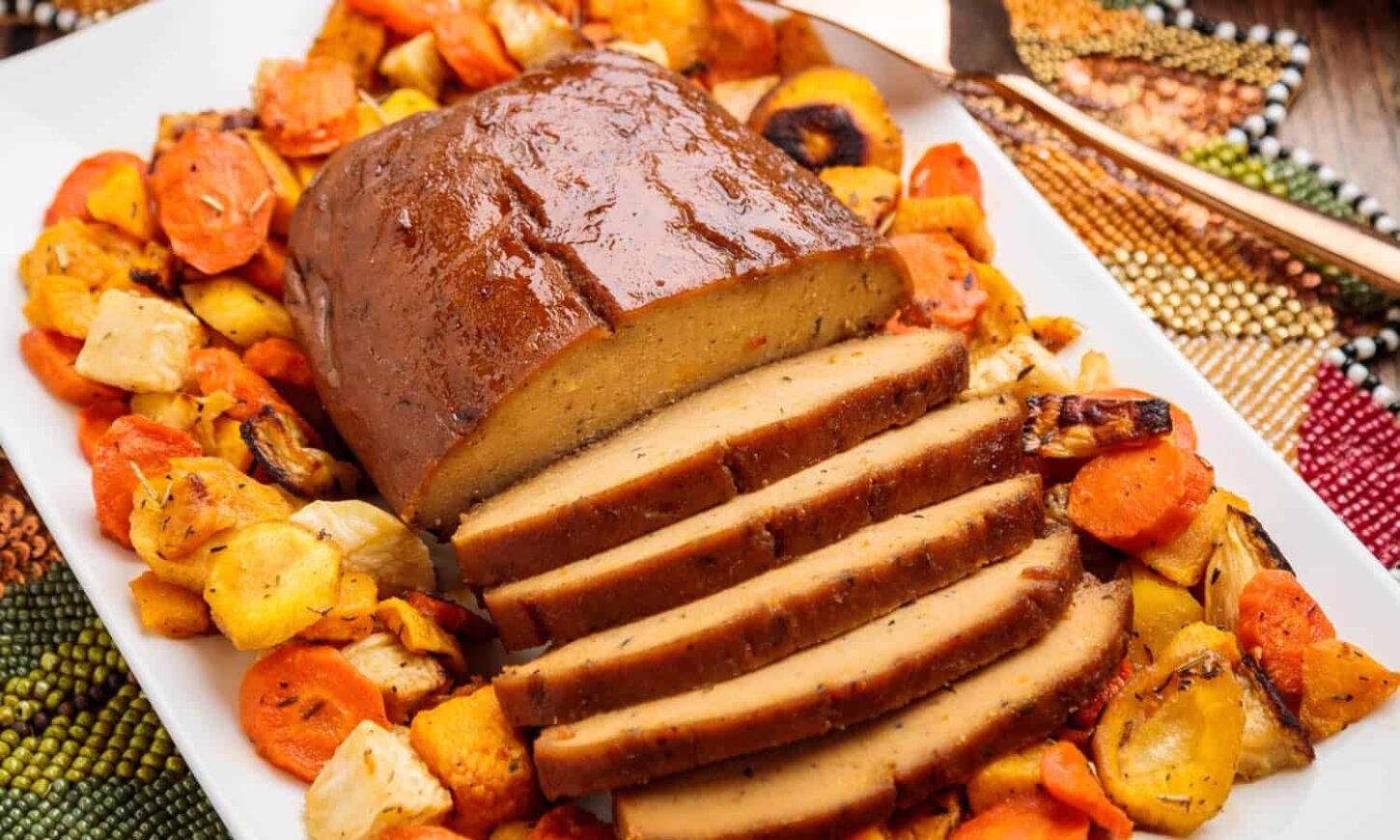 Homemade Seitan Turkey Roast on Thanksgiving Dinner Platter