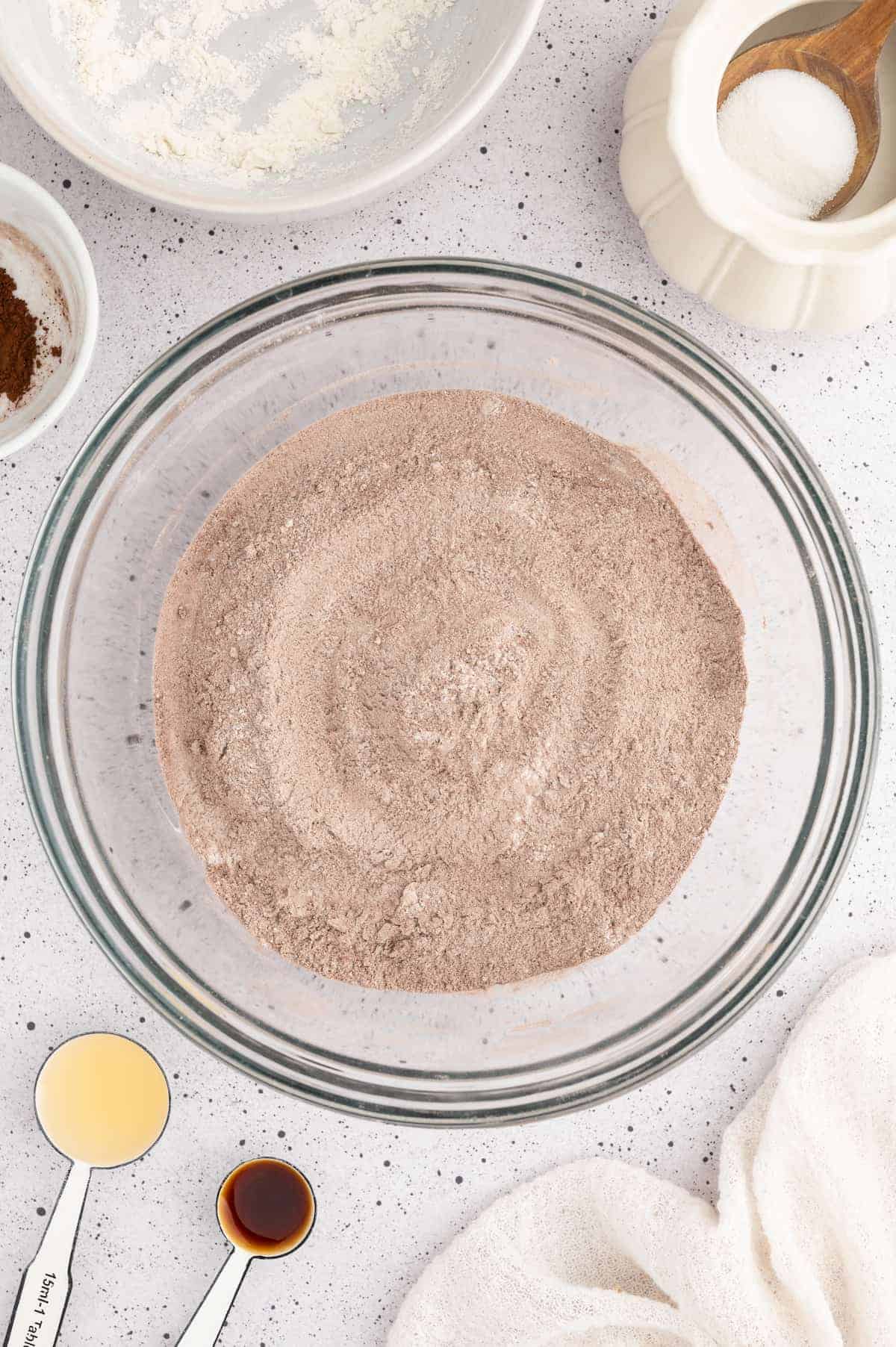 Dry ingredients sifted in a mixing bowl.