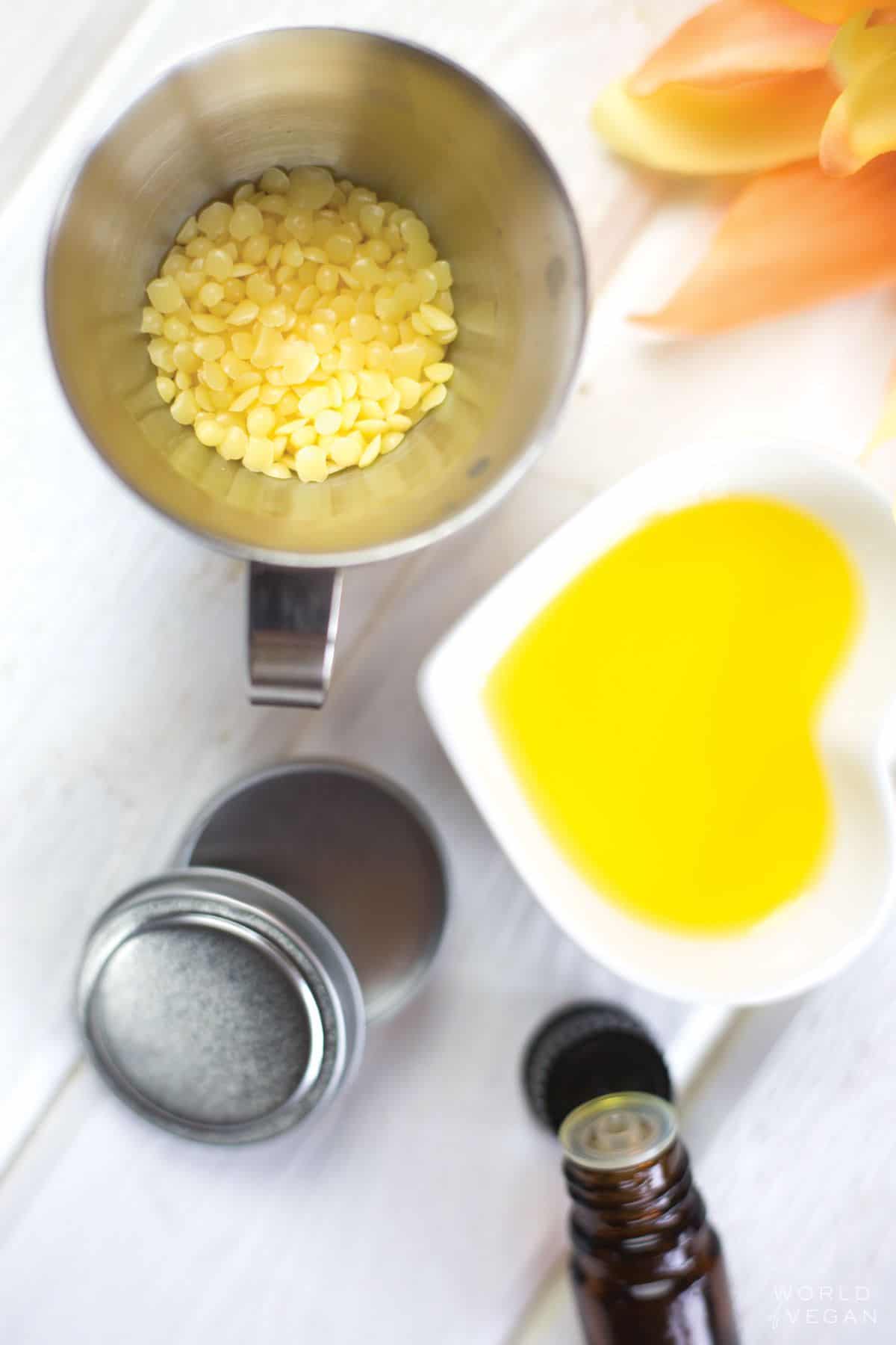 Ingredients for solid perfume in separate bowls.