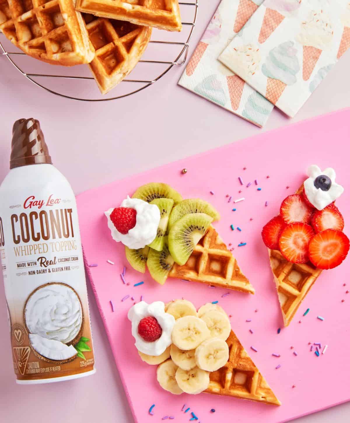 Store bought vegan whipped cream from Gay Lea in a can with waffles fruit cones. 