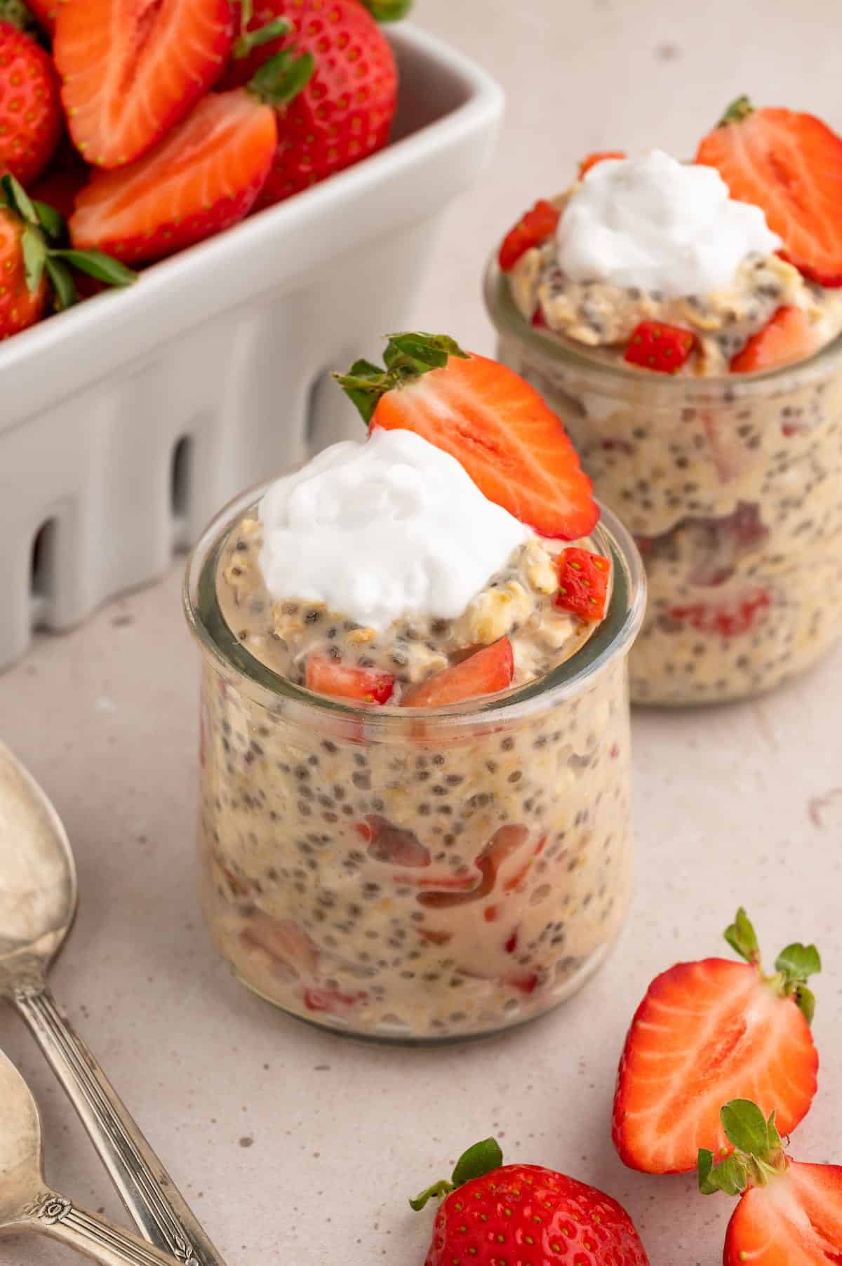 An angled shot of strawberries and cream overnight oats.