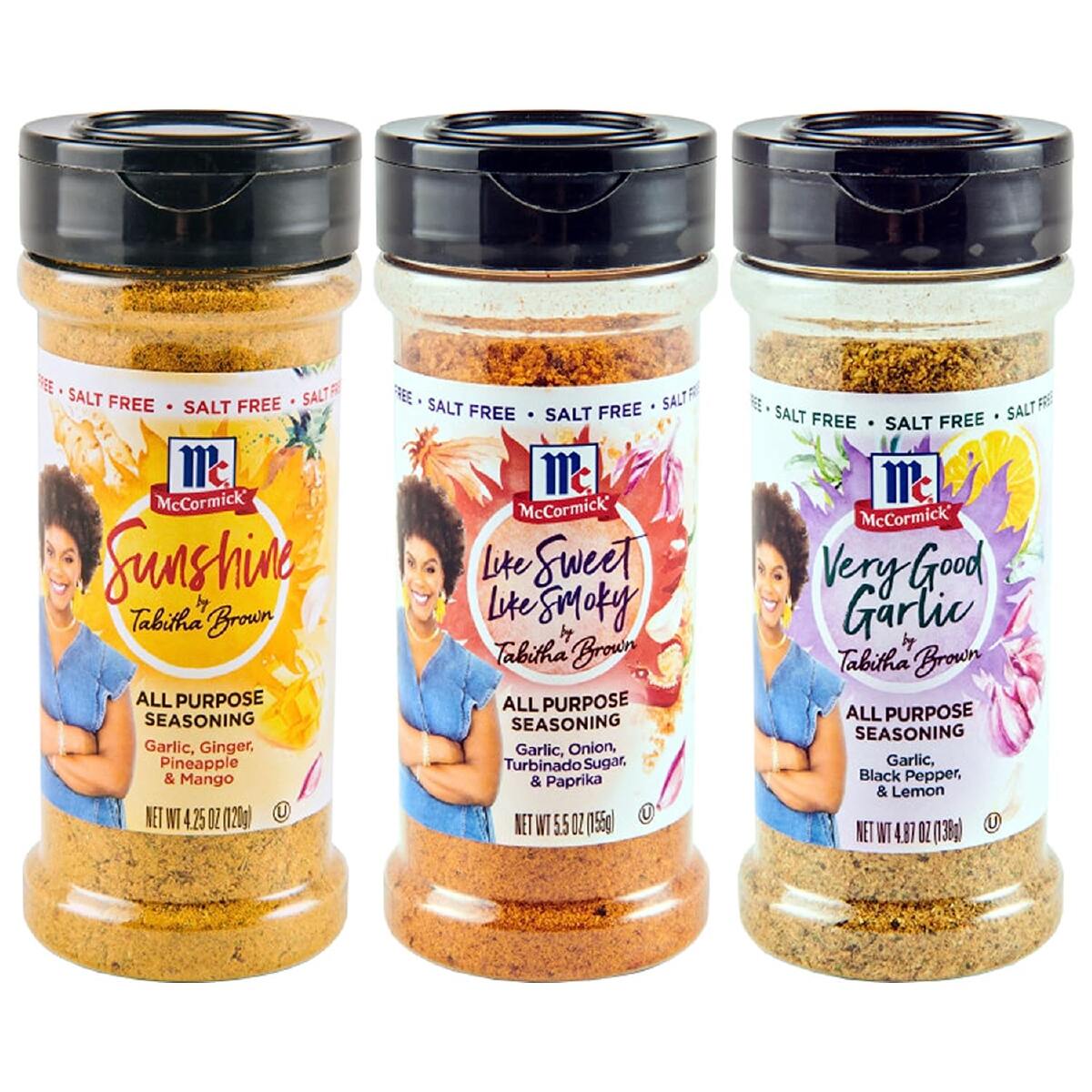 Three plastic bottles of Tabitha Brown all-purpose seasonings with black lids on a white background. 