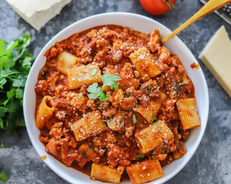 Vegan Italian Recipe for Tofu Bolognese Vegan Pasta Dish Garnished With Herbs