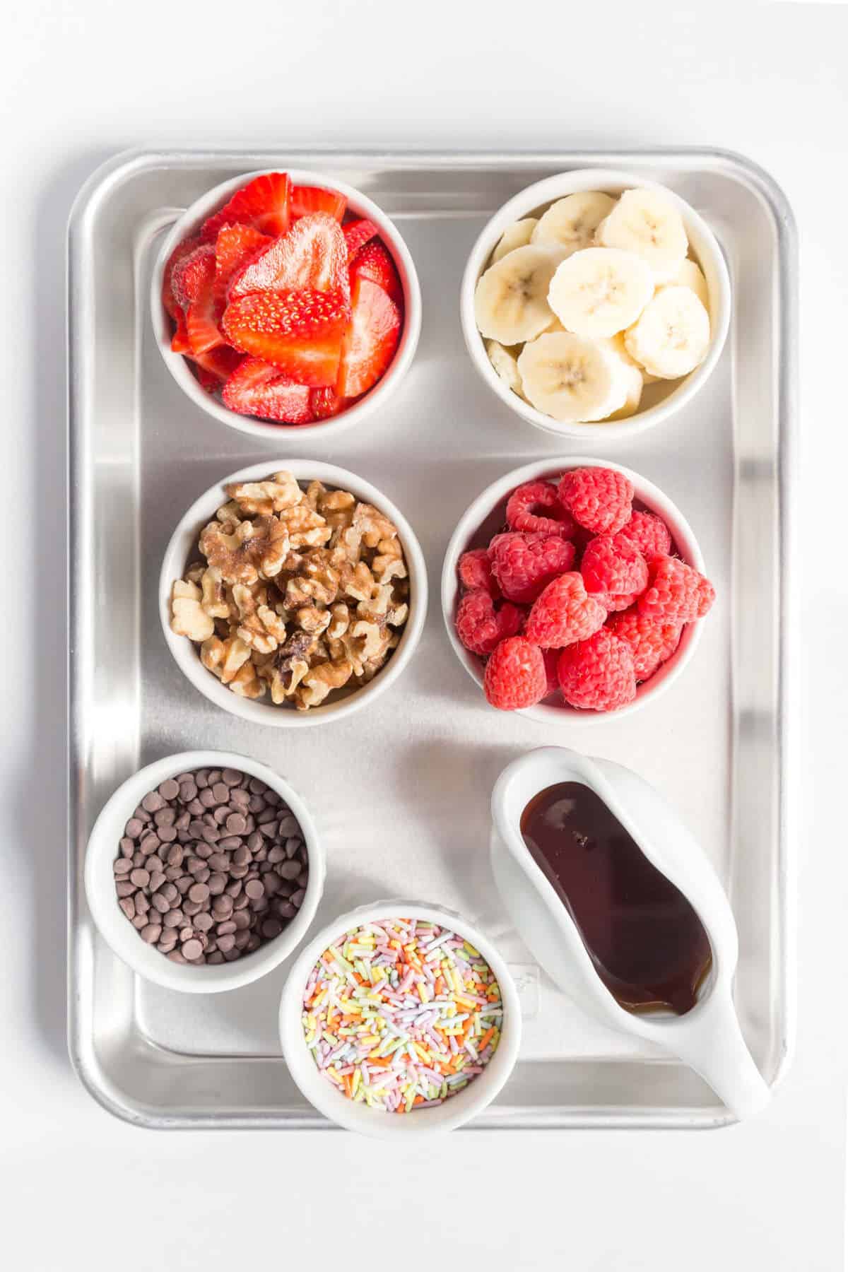 Toppings placed in small bowls.