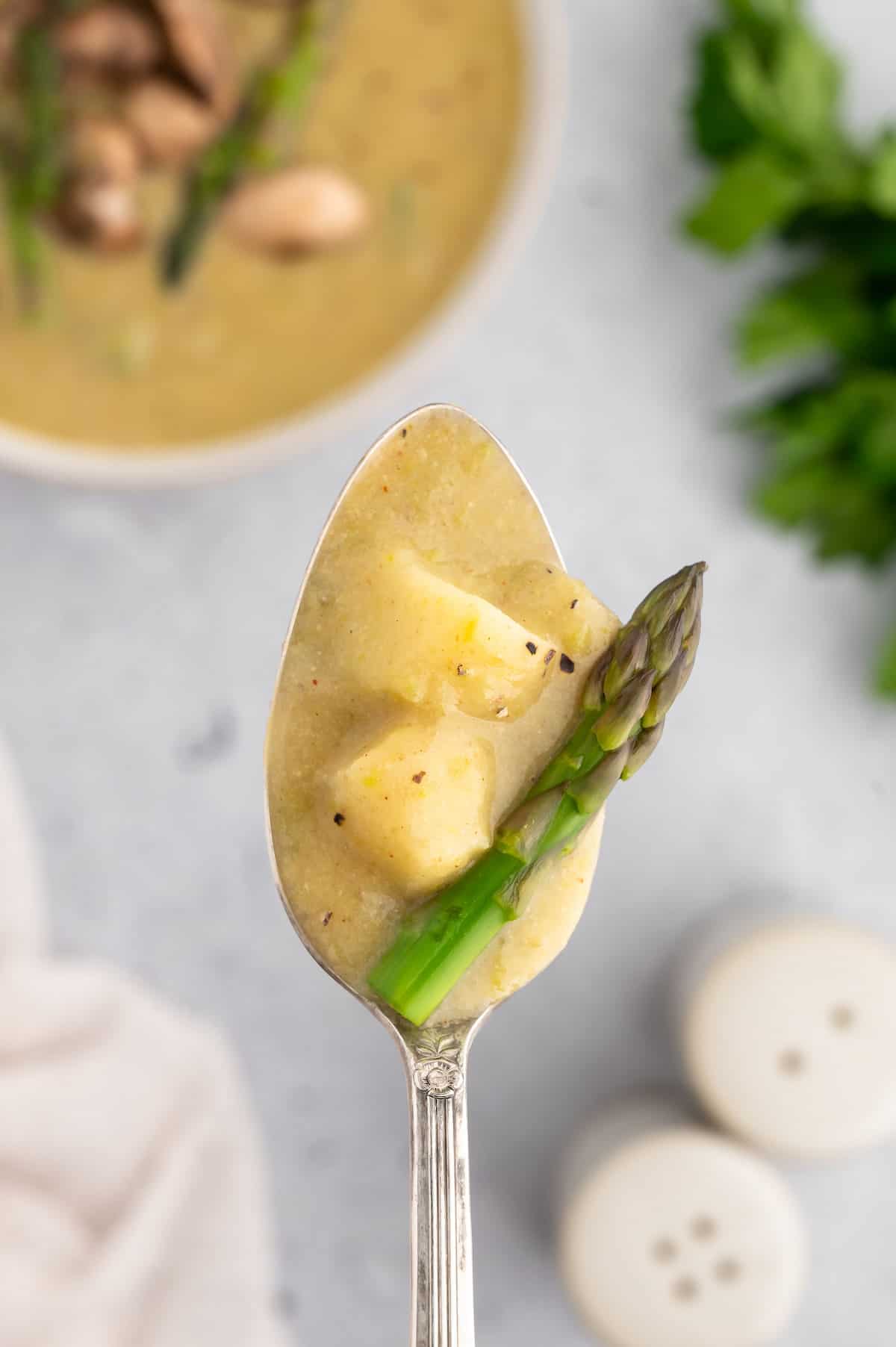 A spoonful of vegan asparagus soup.