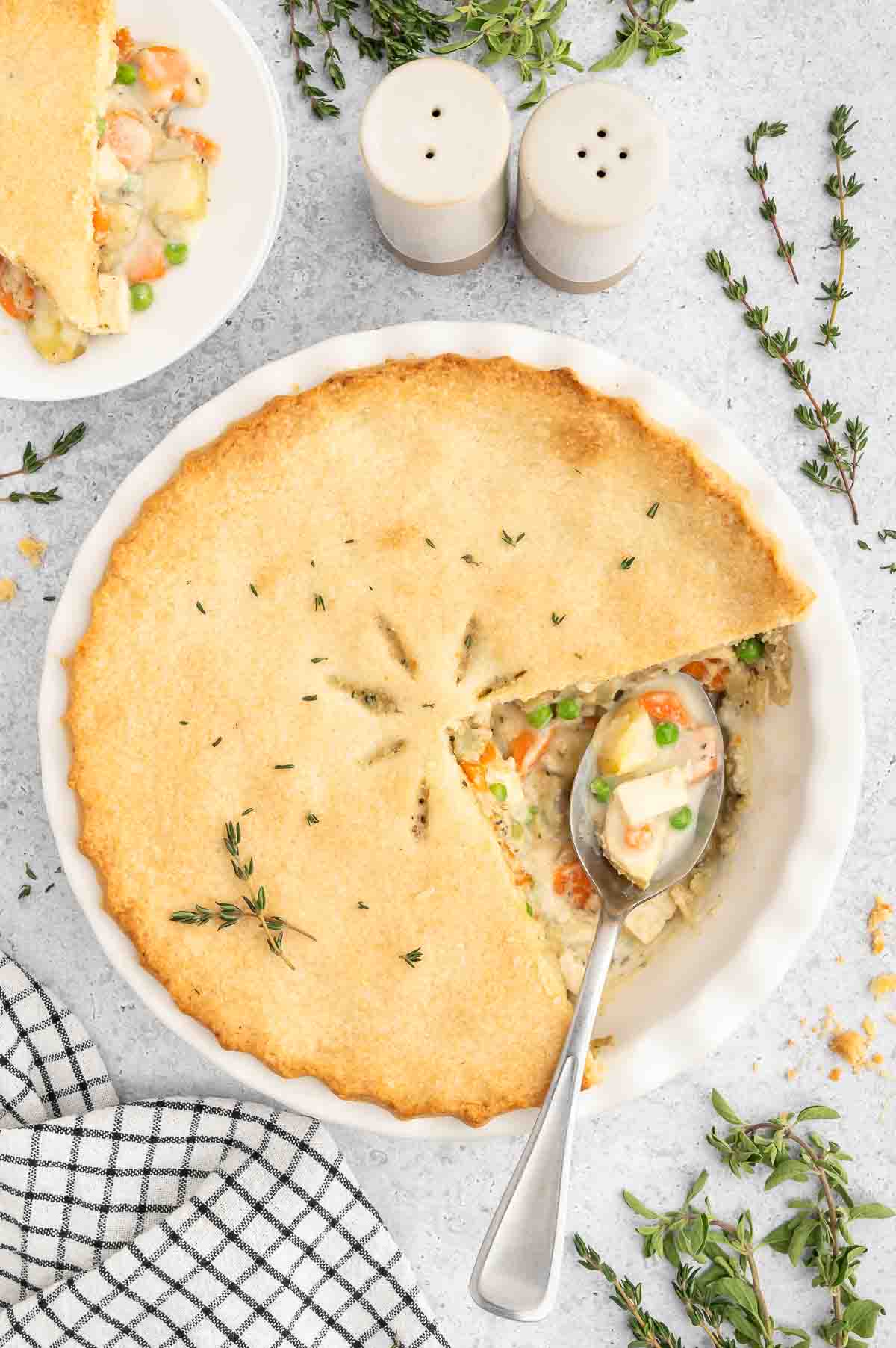 A vegan chicken pot pie, sliced to show the interior.