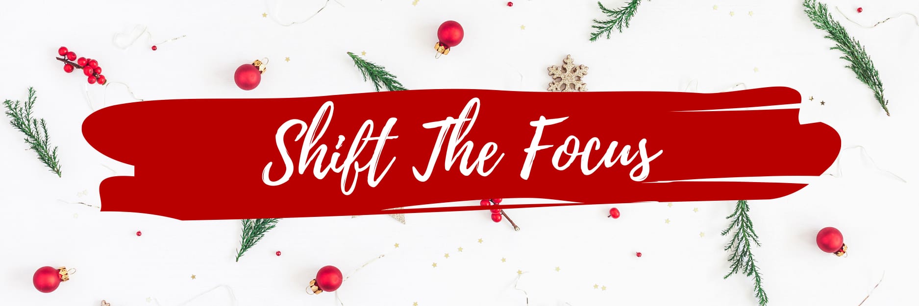 Light background with tree ornaments and text overlay "Shift The Focus."