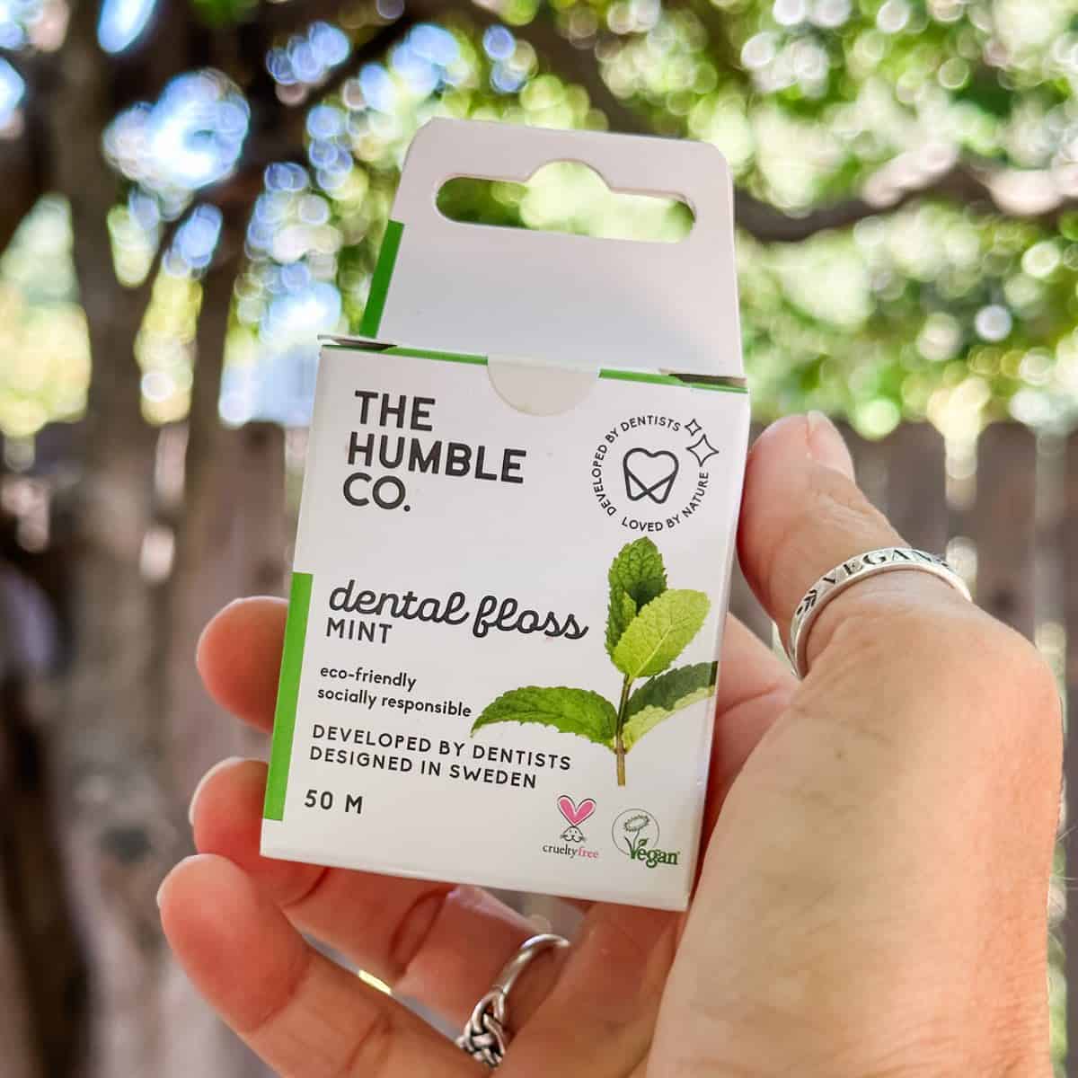 Vegan floss brands and packaging including the zero waste cardboard dental floss from The Humble Co.