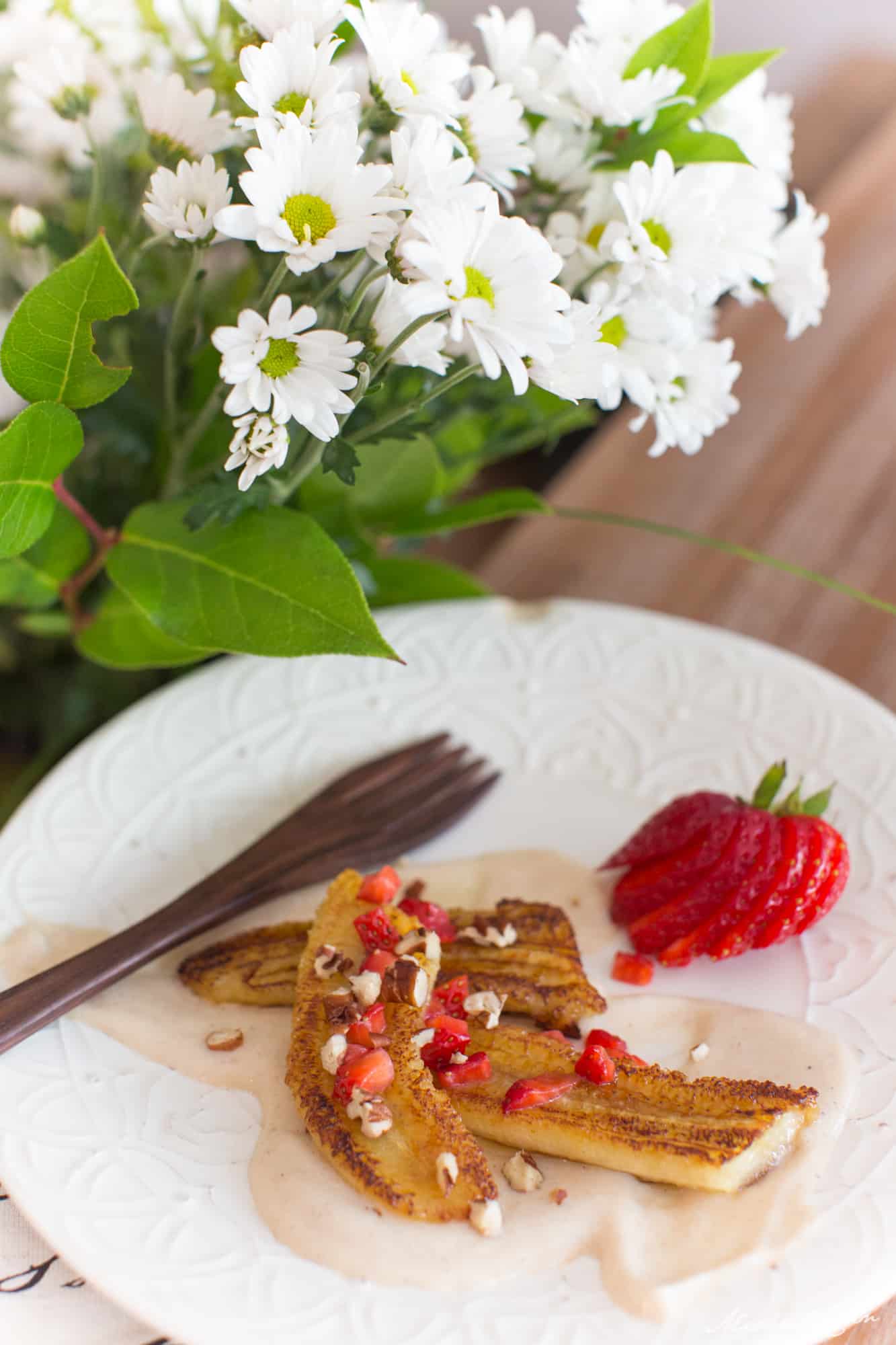 vegan grilled banana with silken tofu cream sauce served on a plate