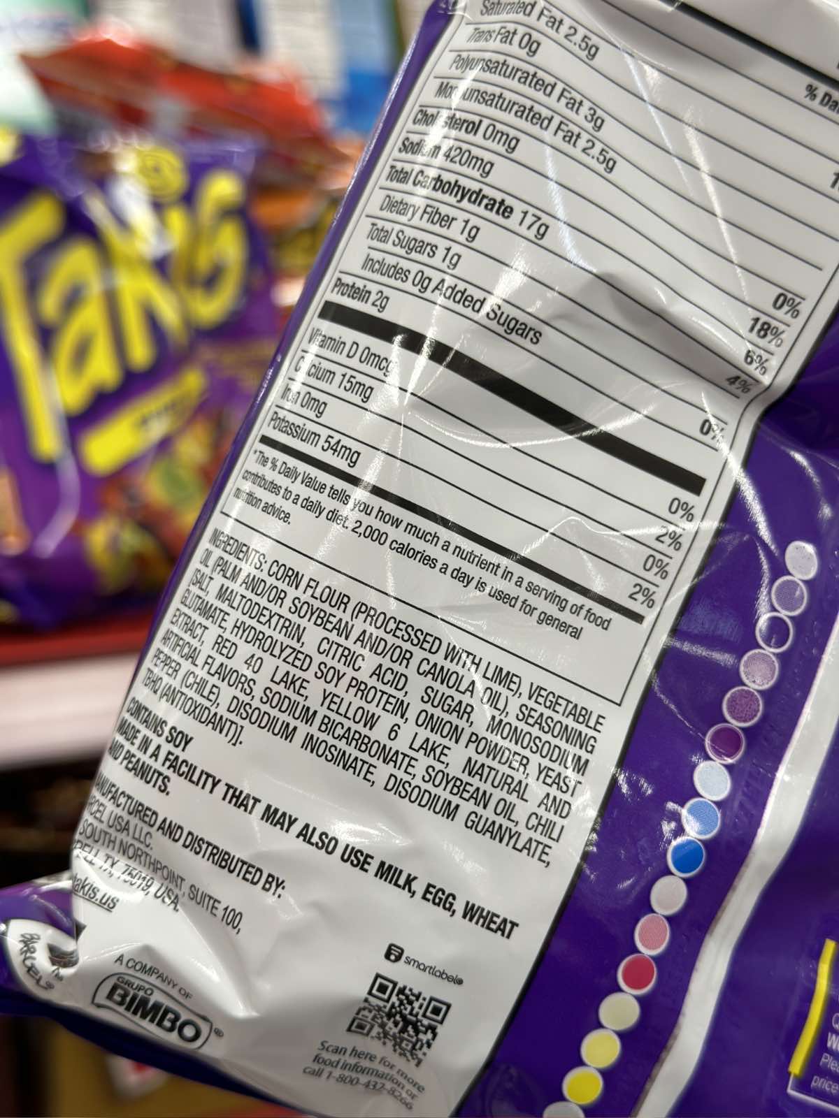 The back of a bag of Fuego Takis showing the vegan ingredients listed. 
