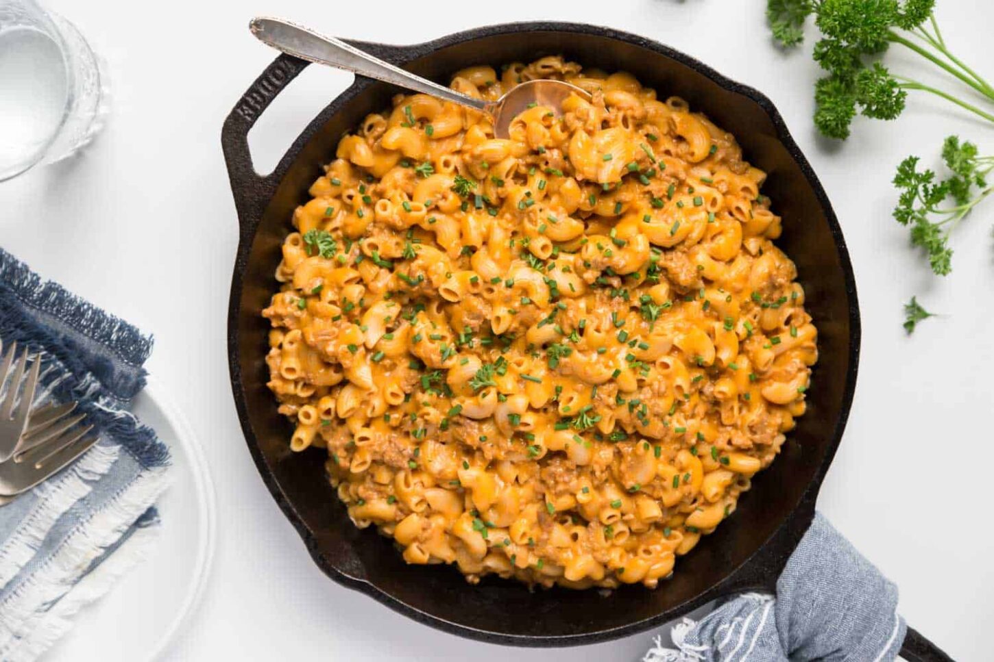 vegan hamburger helper recipe cooked in a skillet garnished with parsley