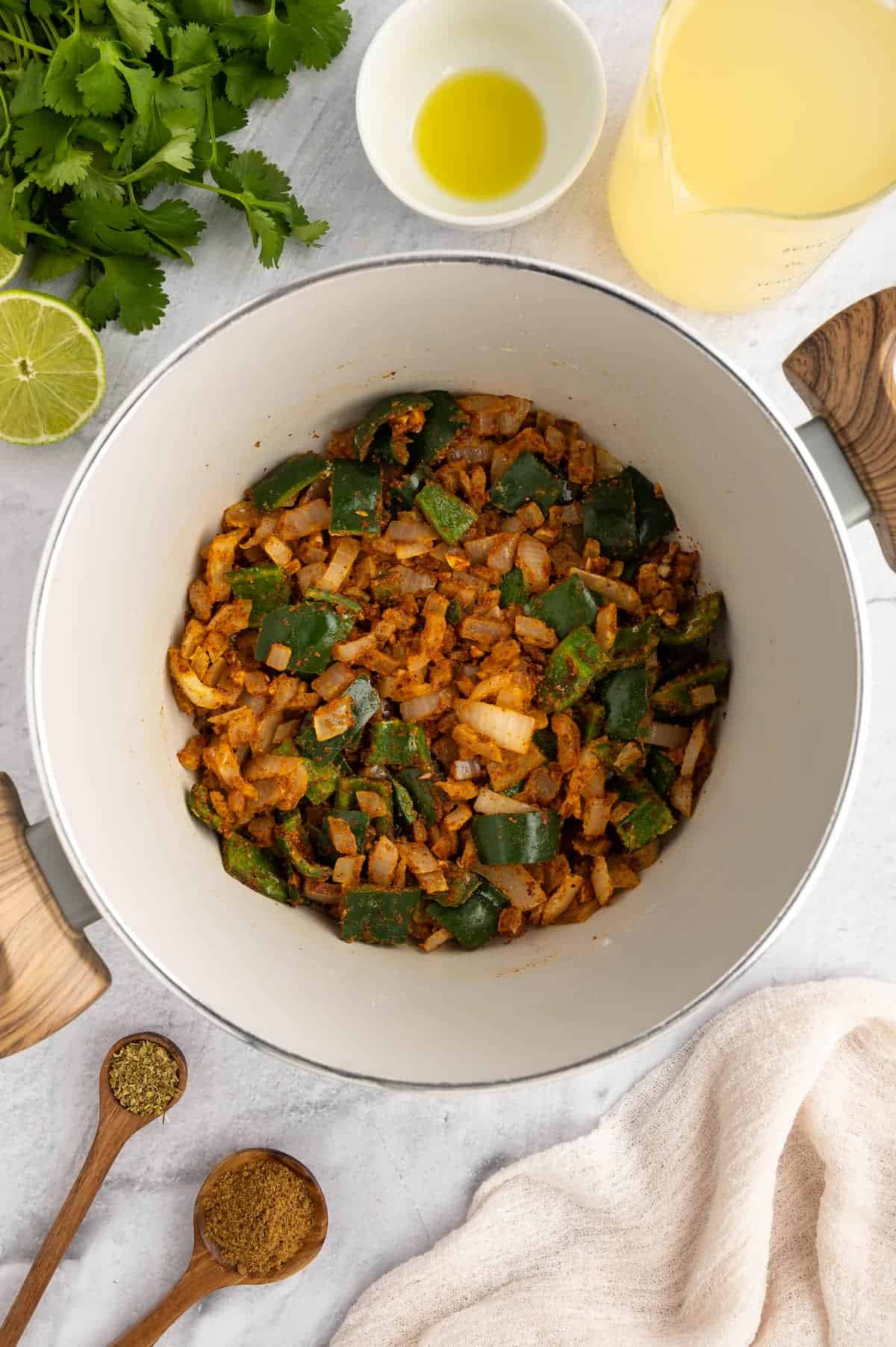 A prep shot of vegan pozole in a white bowl.