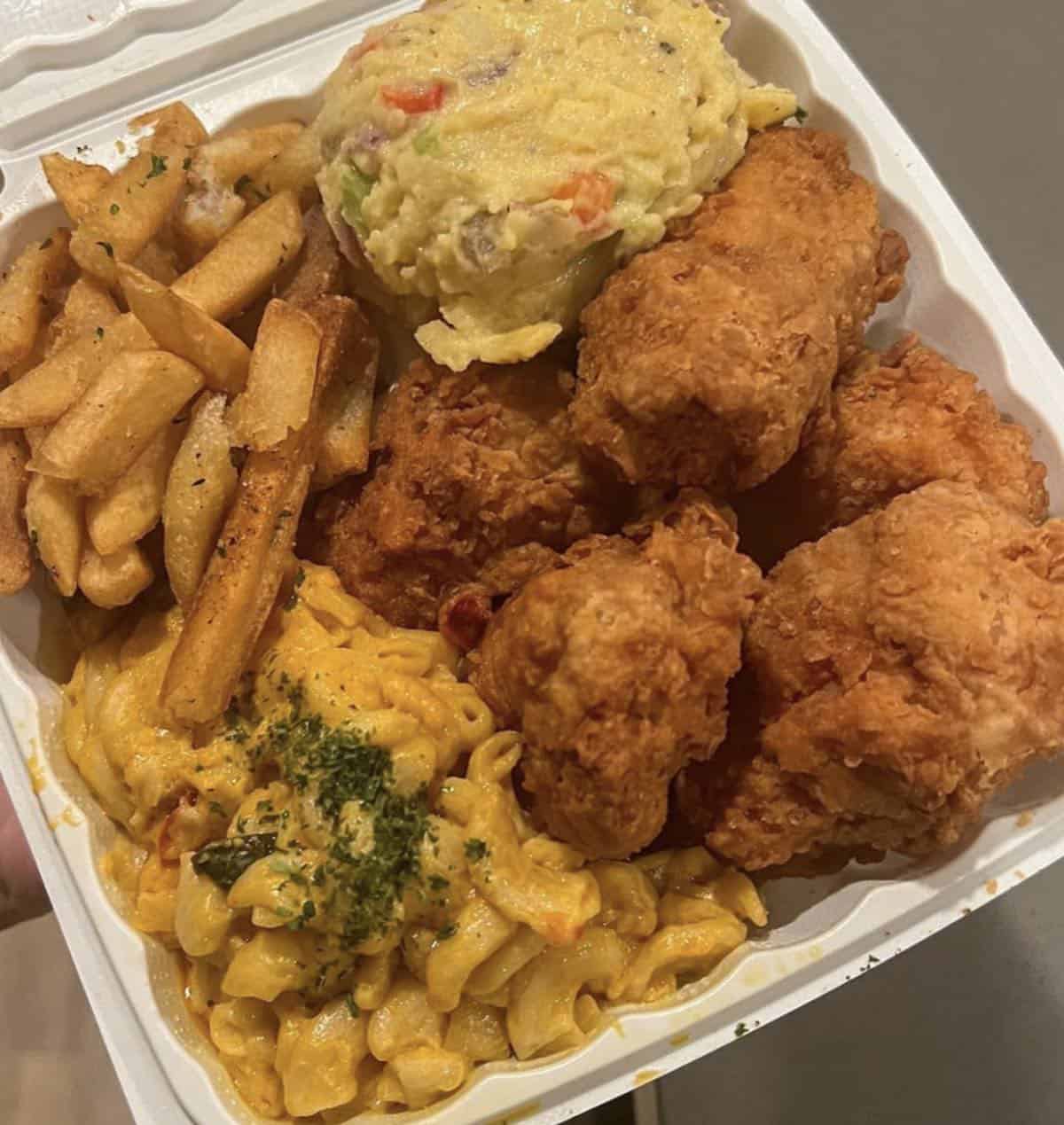 plate of vegan fried chicken and mac cheese soul food from vegan mob in oakland