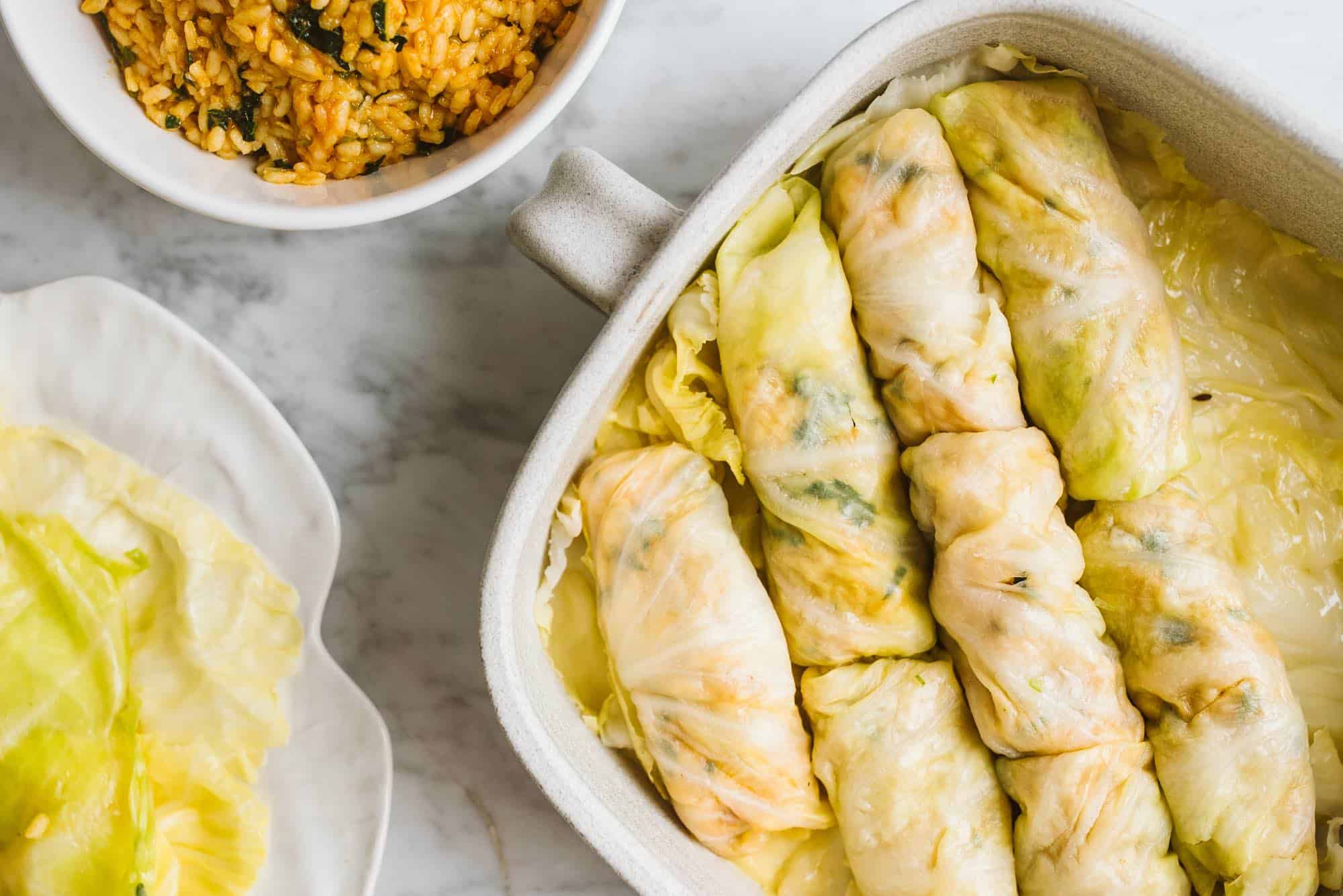 Vegan Stuffed Cabbage Rolls in serving dish.