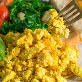 vegan tofu scramble eggs on a fork